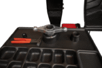 Tool tray holding the Coats wing nut, cones, and wheel-weight tools on a Coats balancer