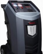 Angled front view of a Robinair automotive A/C recovery and recharge unit, showcasing its ergonomic design, pressure gauges, digital display, and integrated refrigerant reservoir