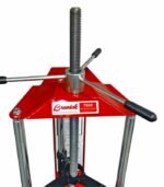 Top view of the Branick 7600 showing the acme-thread compression screw and long torque handles attached to the red upper plate