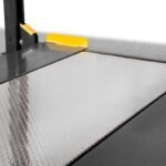 Heavy-duty aluminum solid deck provides durable, corrosion-resistant support on BendPak parking lifts.