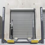 Four post lift car storage by BendPak. Safely stack vehicles and maximize garage space.