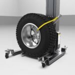 BendPak portable battery-powered wheel lift for busy shops