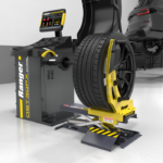 Ranger RWL 175 wheel lift shown paired with a wheel balancer to reduce strain and increase efficiency during tire balancing tasks. Get yours at Wrenchers.com. 5150593