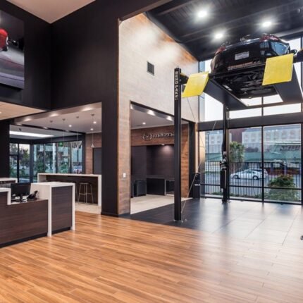 HD 7PXW Car Dealership Display with extra tall four post lift by Bendpak 5175516