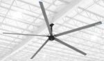 Top-down perspective of the Cool Boss CB-24 HVLS fan with aluminum blades and blue tip ends, engineered for maximum air coverage in large facilities