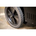 Ranger CoolCharge 12-inch rubber rear wheel designed for rolling AC recovery machine across shop floors.