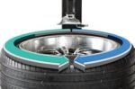 SmartSpeed rim clamping system on the Hofmann Monty 3550EM-SS automatically adjusting turntable speed based on applied torque