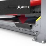 Close-up view of APEX hook-nose ramp locking into BendPak ramp receiver brackets on four-post lift