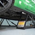 Low-profile QuickJack BL-3500SLX lift frames provide full undercarriage access for brake jobs, suspension work, and exhaust installs. Ideal for lowered vehicles and tight garages.