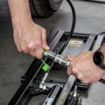 Quick-connect hydraulic fittings allow fast, secure hose connections for QuickJack portable car lift systems.