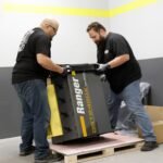 Automotive wheel balancer with digital balancing system and GR-YEL design