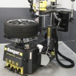 The Ranger R76ATR tire changer features a full power-assist tower for effortless handling of stiff sidewalls, low-profile tires, and high-performance wheel assemblies