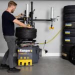 See the Ranger R980DP tire changer in action featuring dual assist arms for fast, controlled mounting and demounting. Built for high-volume shops servicing low-profile and performance tires. SKU 5140174.