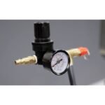 Close-up of the Ranger RD-20SE oil drain’s air pressure regulator and gauge assembly, designed for precise control during pressurized fluid evacuation
