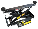 BendPak RJ7W bridge jack mounted on an HD-14T lift, raising a car for suspension and tire service.