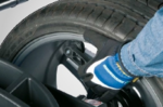 Semi-automatic data entry system on the Hofmann balancer, capturing wheel dimensions quickly through intuitive touch-point measurement
